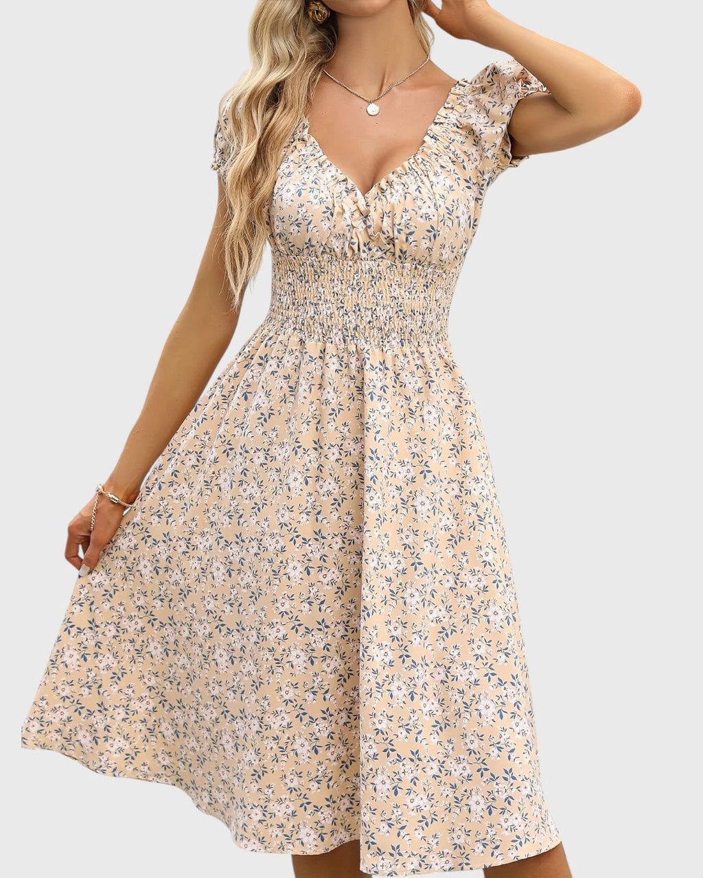 BRITINA™ | Blommig midiklänning med puffärmar och V-ringning