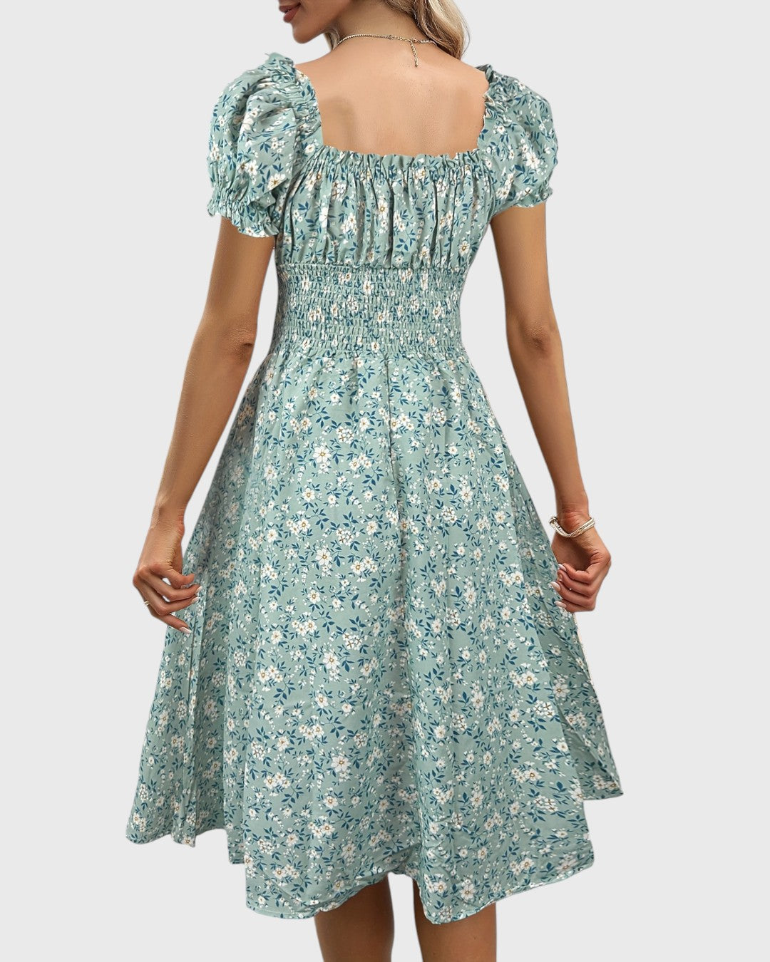 BRITINA™ | Blommig midiklänning med puffärmar och V-ringning