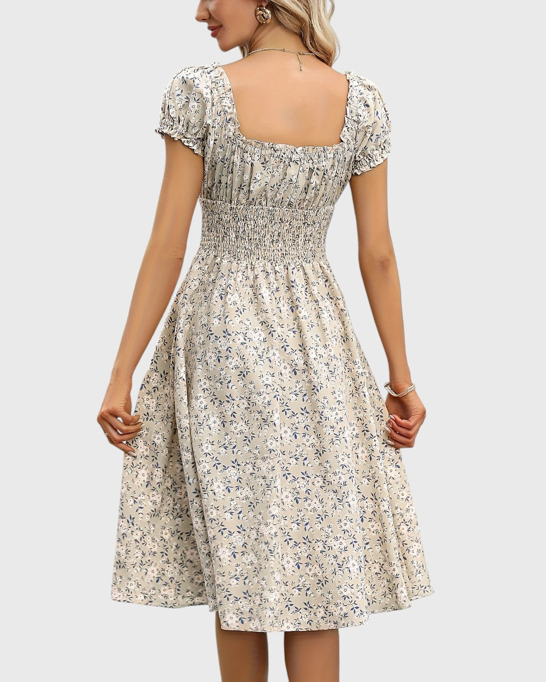 BRITINA™ | Blommig midiklänning med puffärmar och V-ringning
