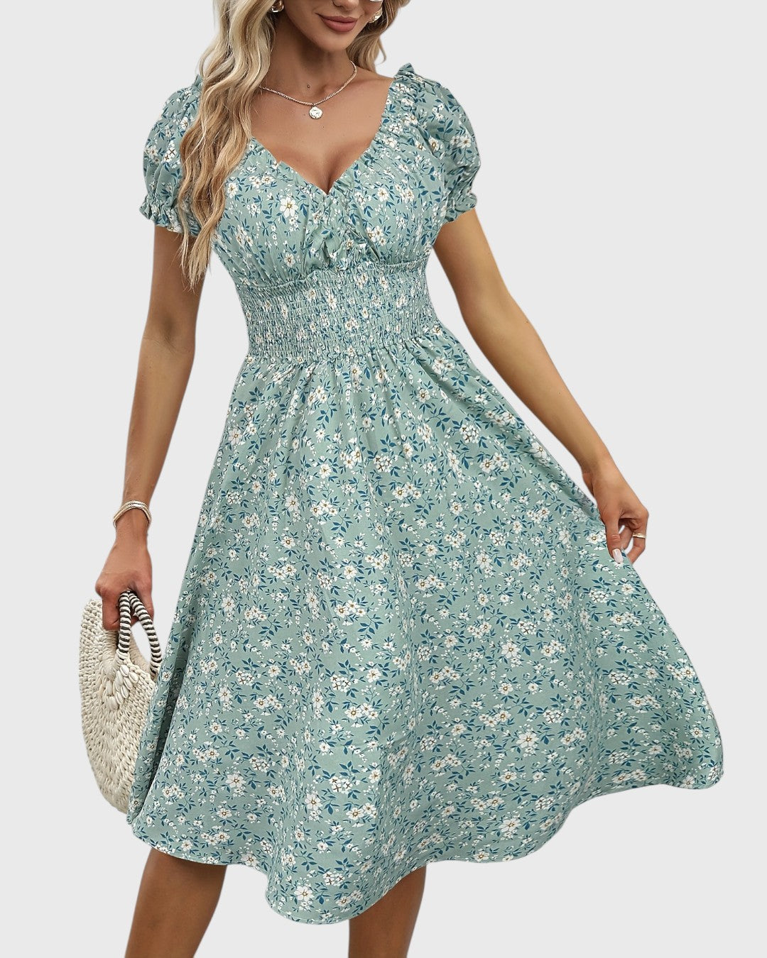 BRITINA™ | Blommig midiklänning med puffärmar och V-ringning